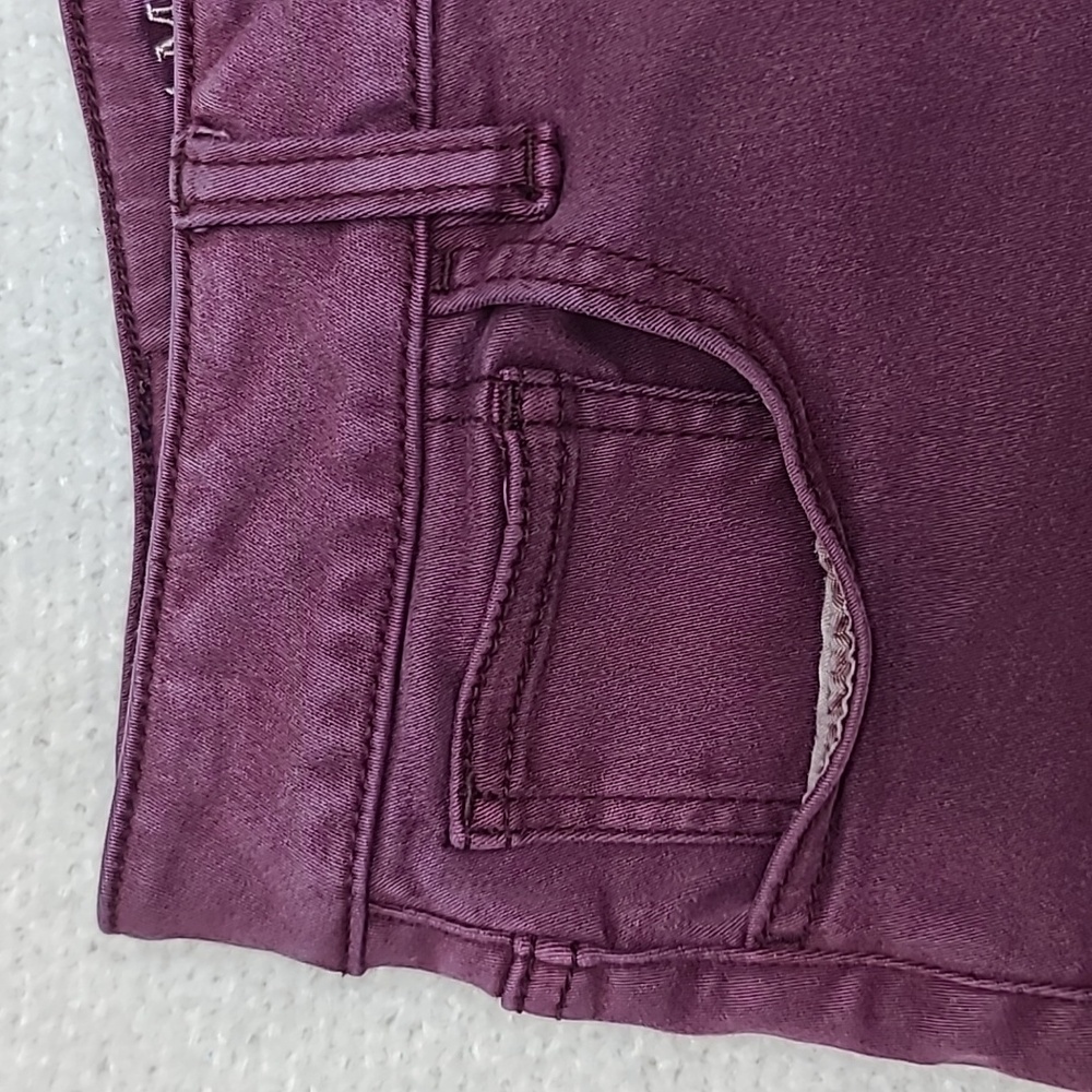 AE Next Level Low Rise Cuffed Raw Hem Cotton Denim Shortie Shorts in Burgundy - Picture 9 of 17